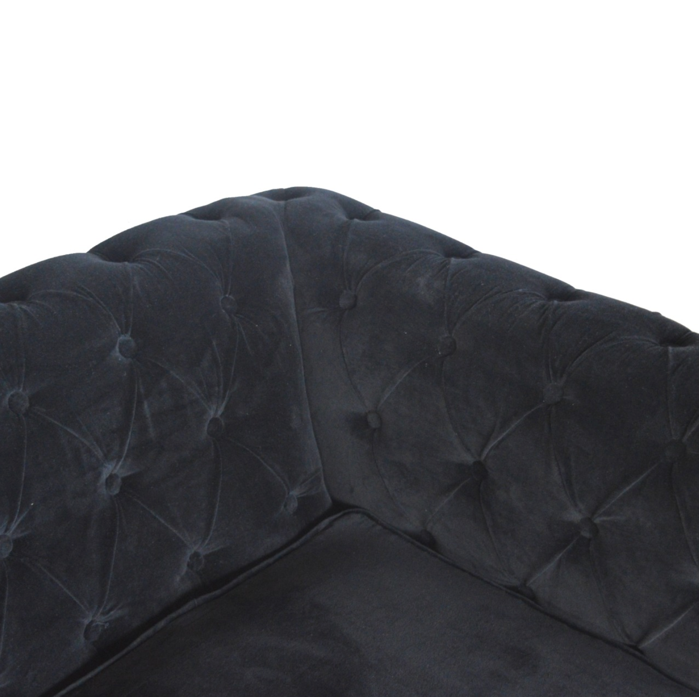 Close-up of Rich Black Velvet Fabric and Deep Button Tufting Details on Chesterfield Sofa