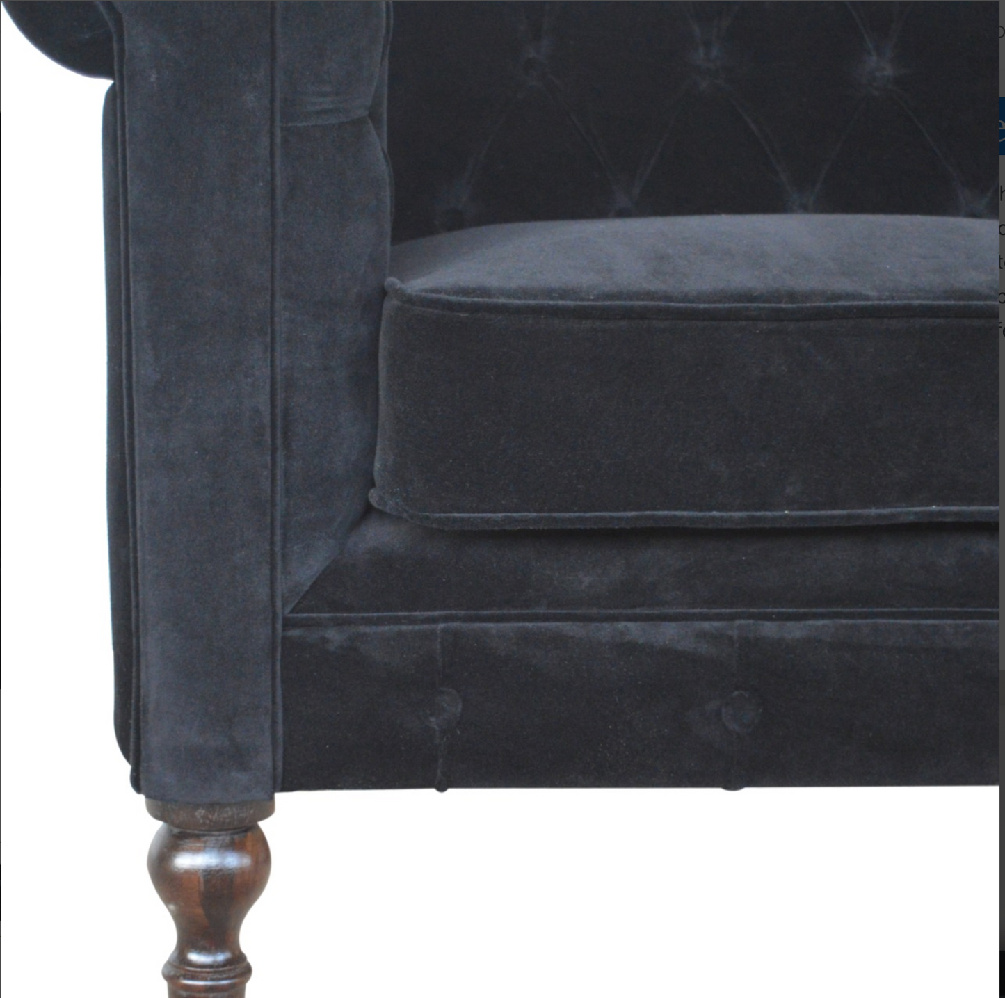 Close-up of Structural Solid Mango Wood Support Legs Beneath the Black Velvet Chesterfield Sofa by Nørthhaus