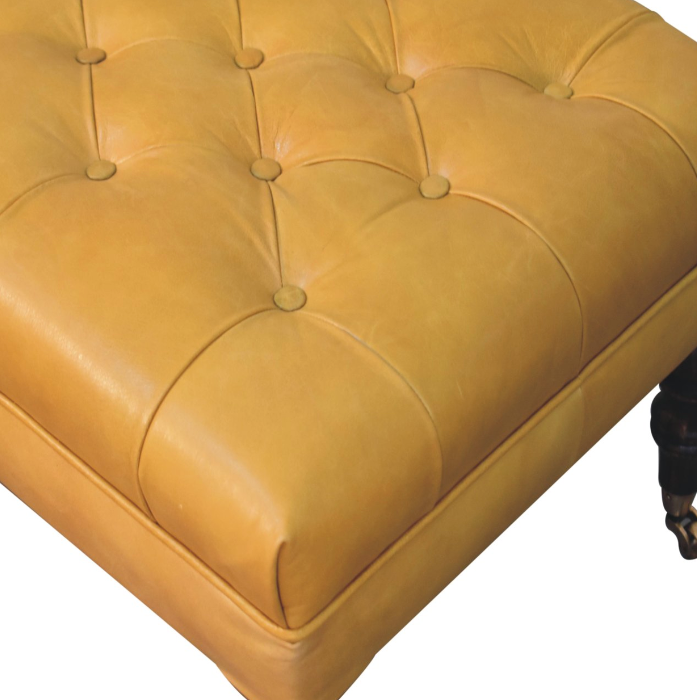 Close-up of Deep Button Tufting and Natural Leather Texture on Ottoman Surface