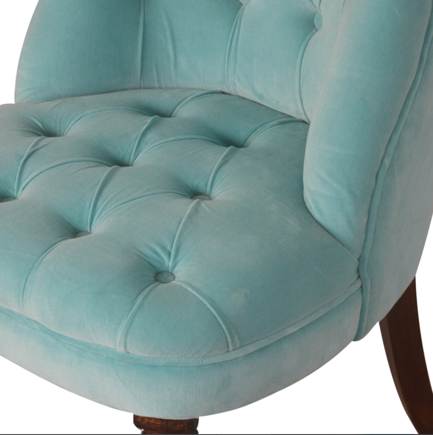 Close-up of Turquoise Velvet Upholstery Texture on Accent Chair